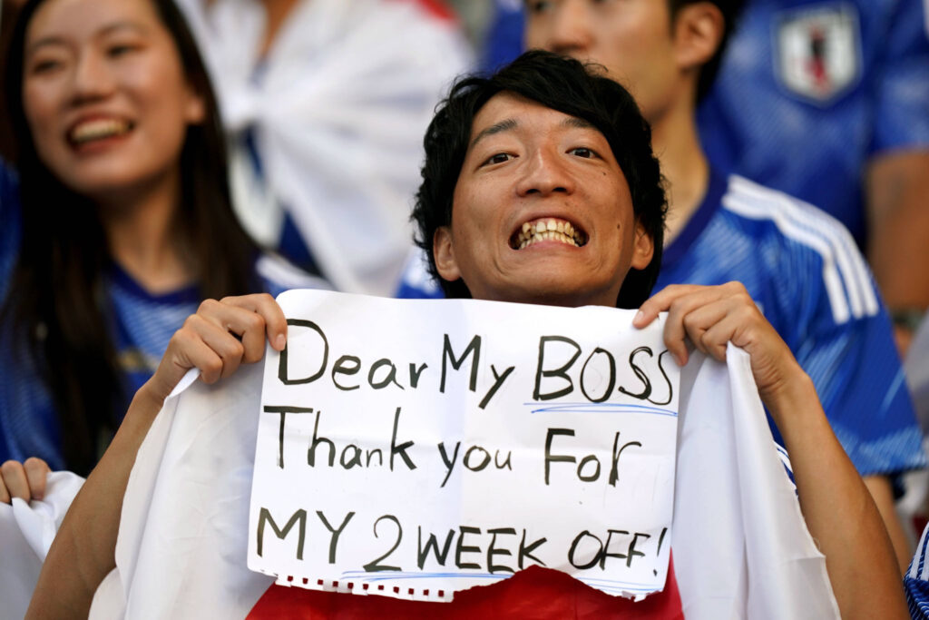 A Japanese fan takes advantage of the Germany match and sends a message to his manager