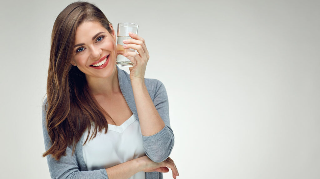 To what degree does drinking water contribute to burning belly fat?